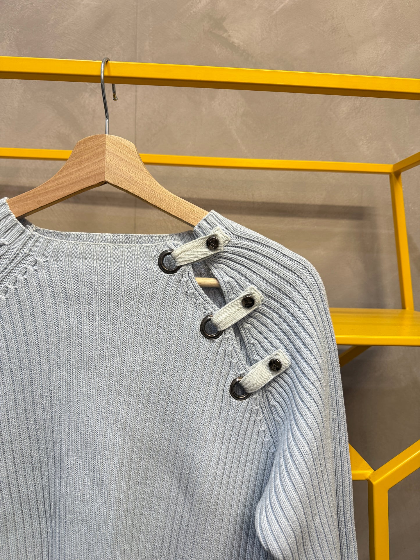 blue ribbed jumper with side buttons