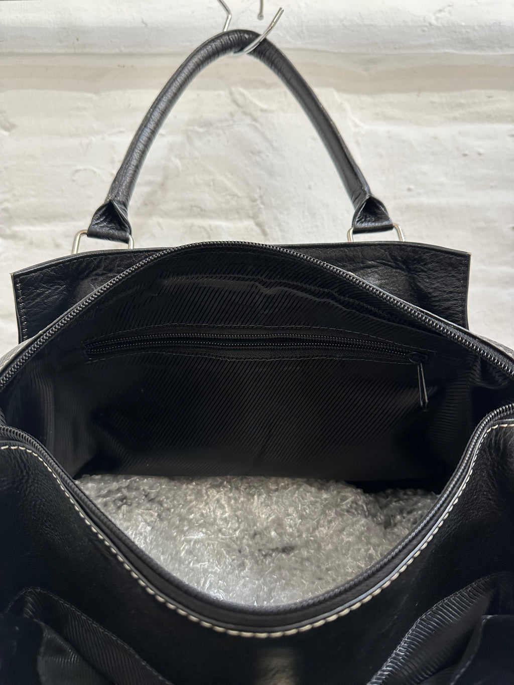 Cow hide shoulder bag