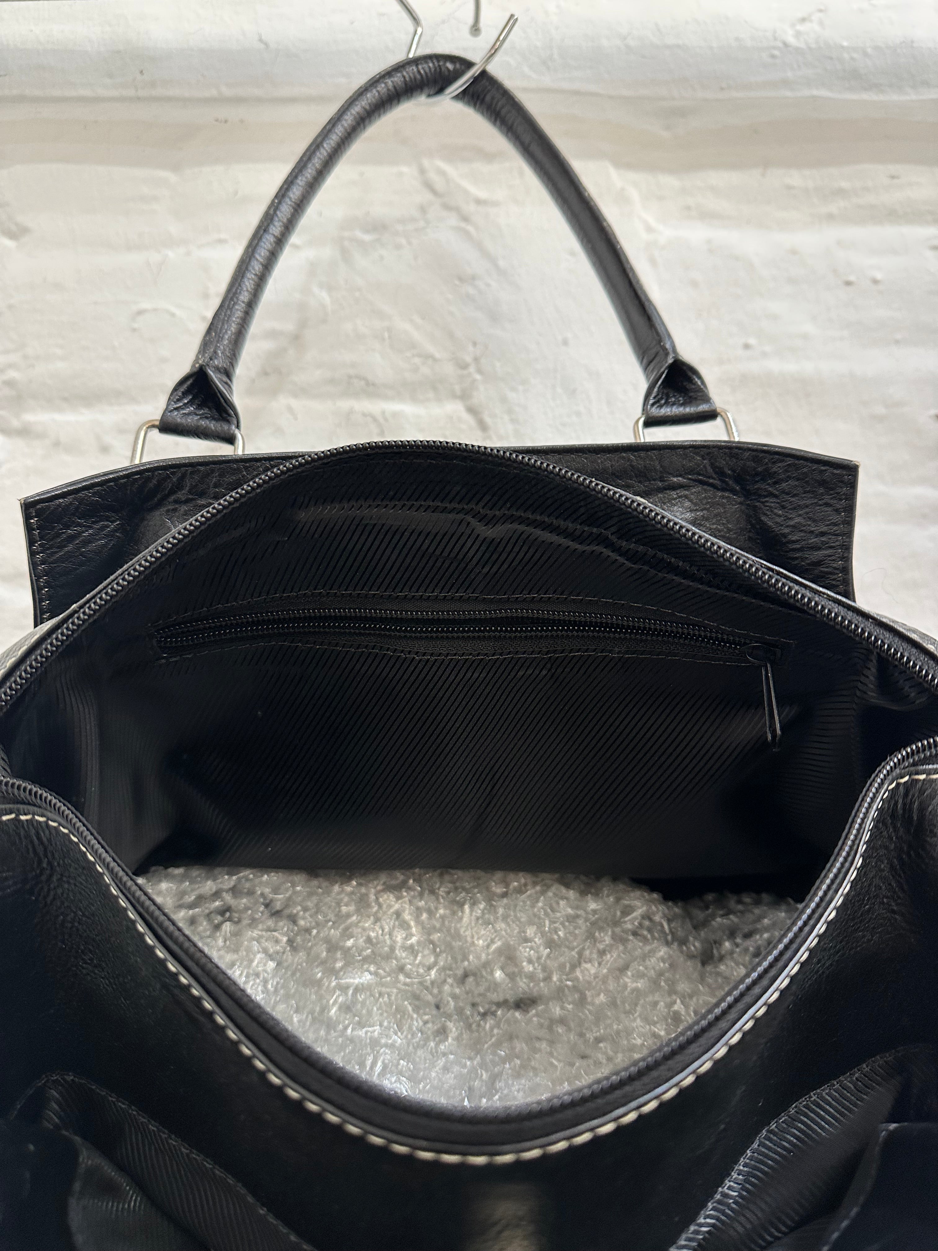 Cow hide shoulder bag