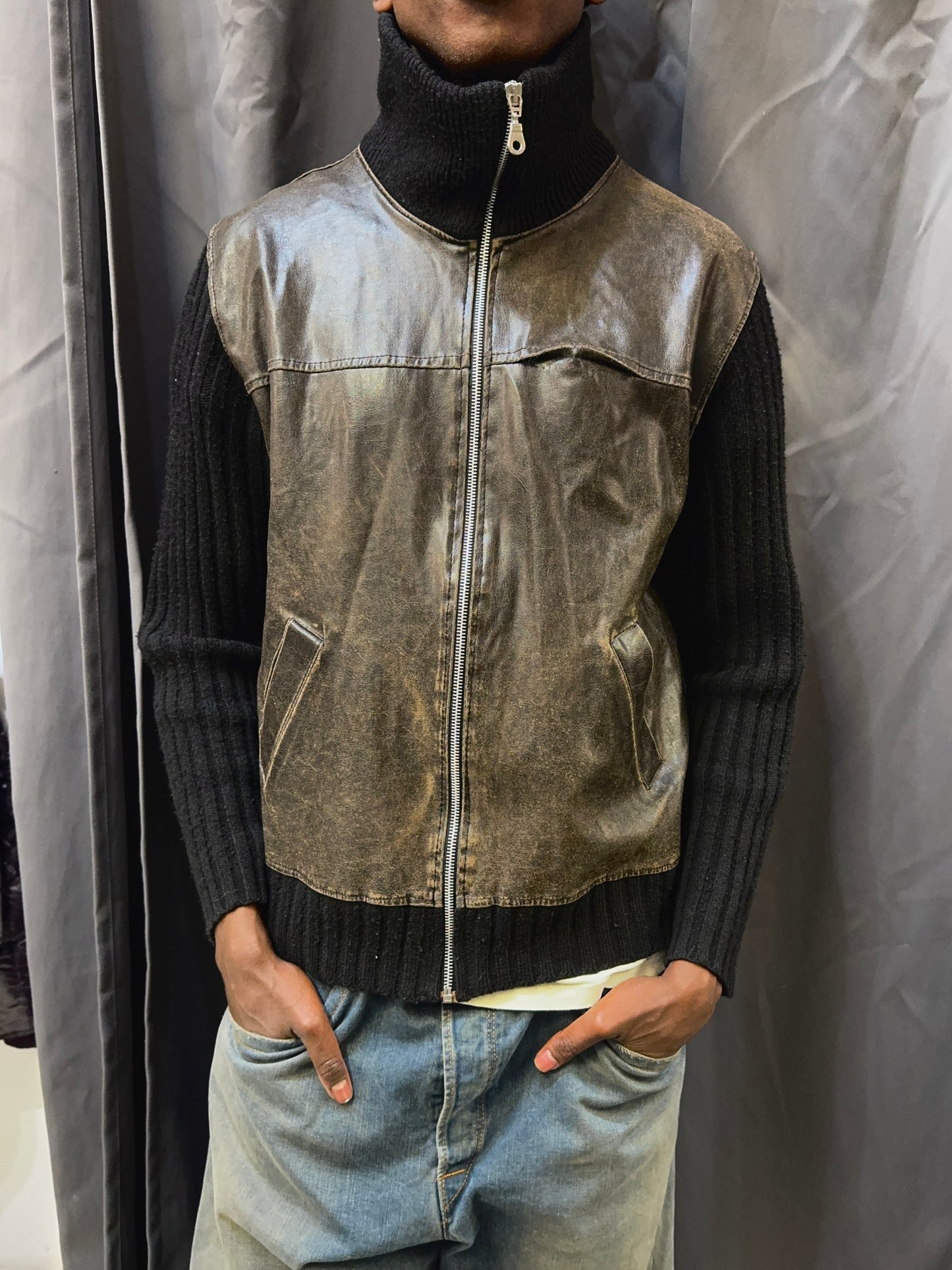 brown and black zip up jumper