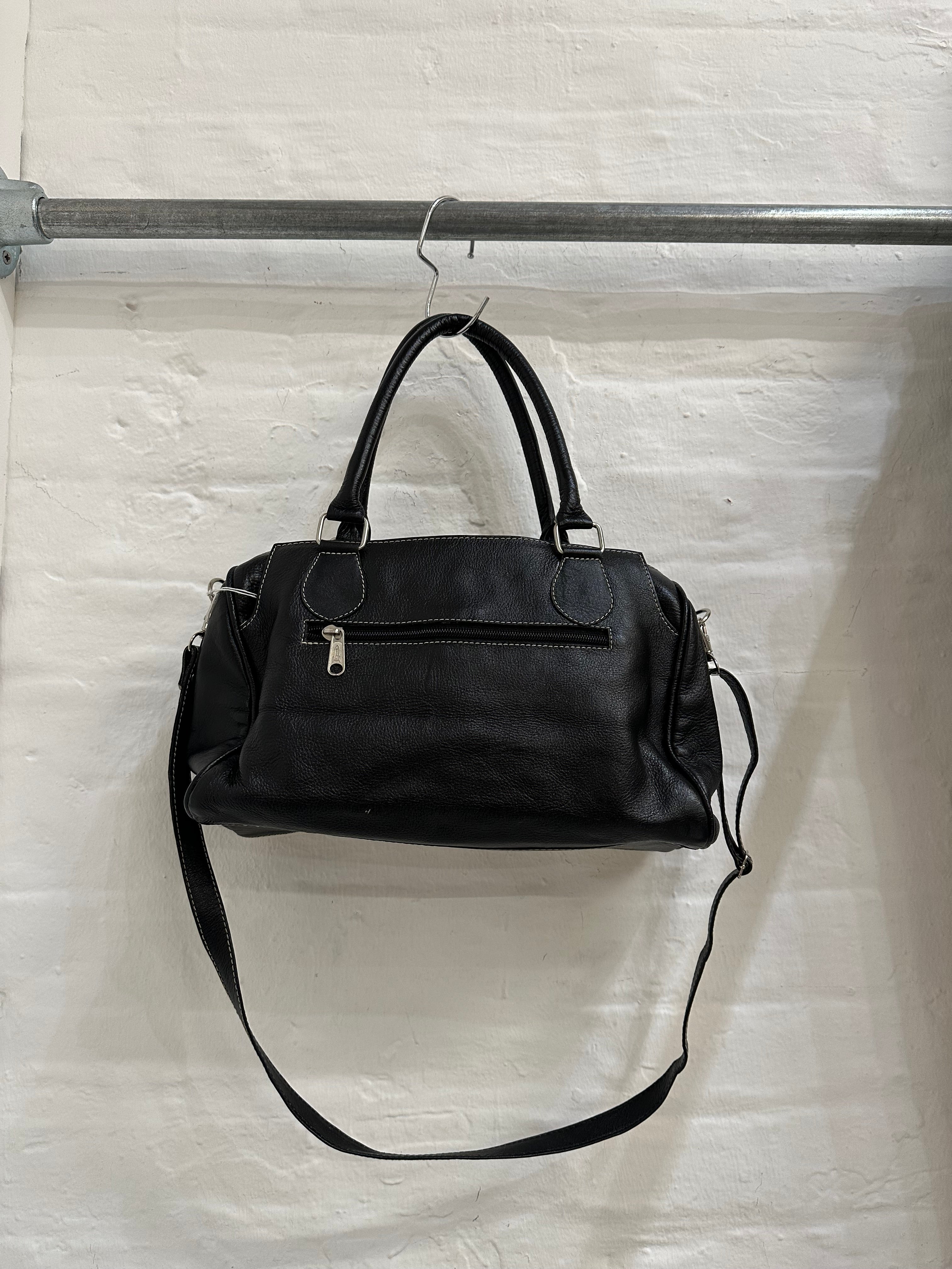Cow hide shoulder bag