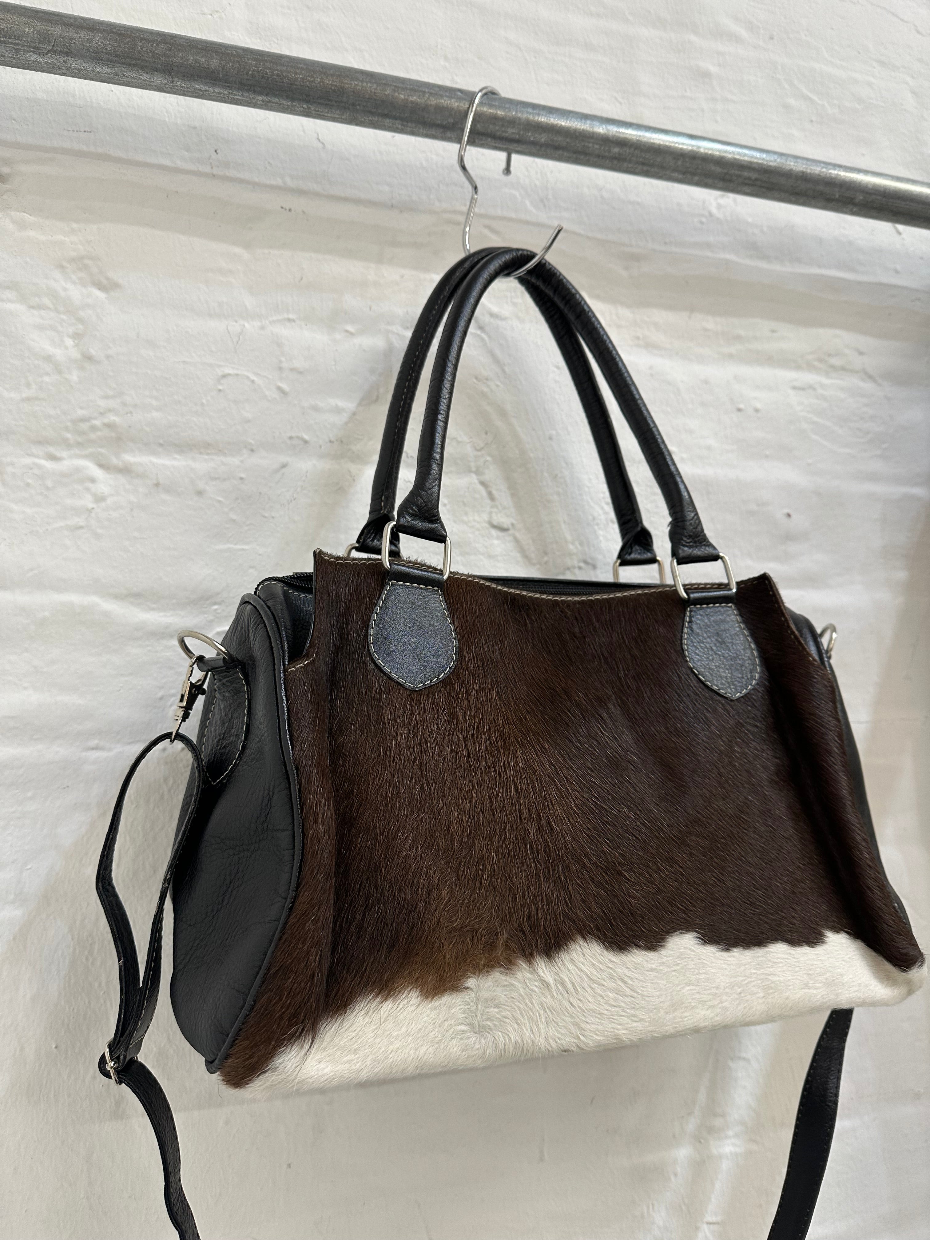 Cow hide shoulder bag