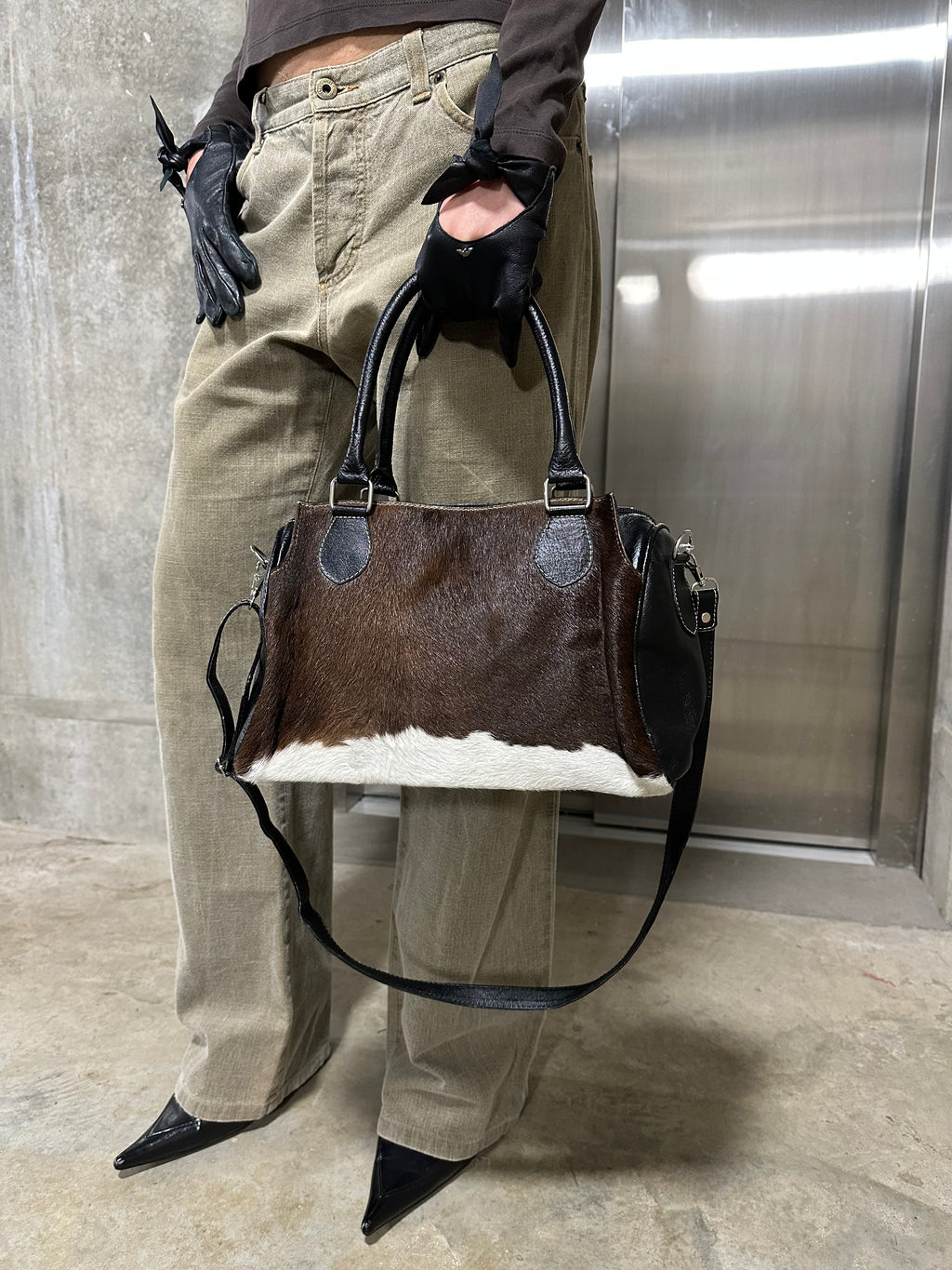 Cow hide shoulder bag